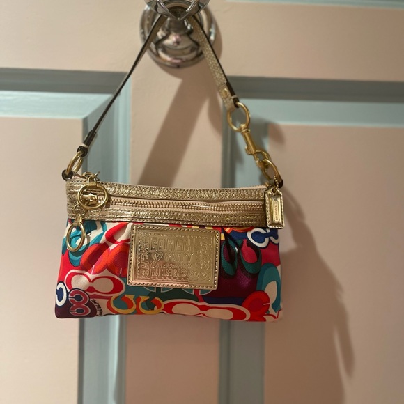 Coach Poppy Multicolor Wristlet with Gold Details - Picture 1 of 13